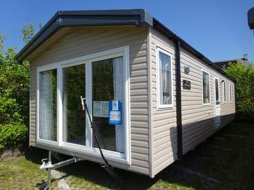 Prachtige caravan te koop aan zee: Jouw eigen stukje paradijs!